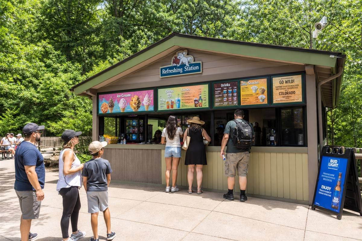 Outdoor refreshment kiosk serving ice cream and snacks to visitors at Cotswold Wildlife Park